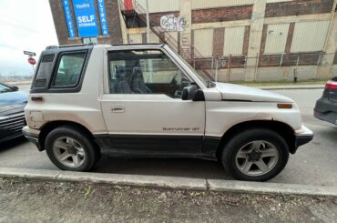 I spotted a [Pontiac Sunrunner GT] The Canadian version of the Geo/Chevy Tracker.