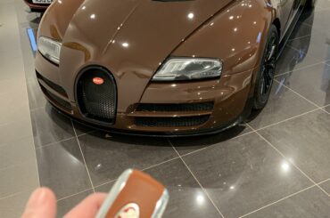 [Bugatti Veyron SS] with a worn key.