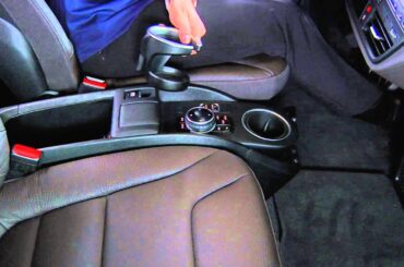 Remove and Store the Cup Holder | BMW Genius How-To