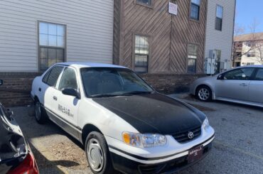 Found this gem in my old college campus. Describe the driver of this car