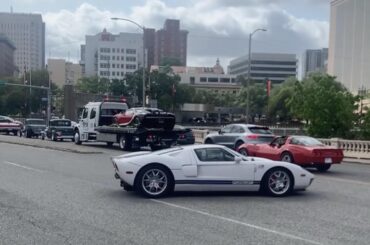 [Ford GT] with something not so subtle in the background, captured on a potato