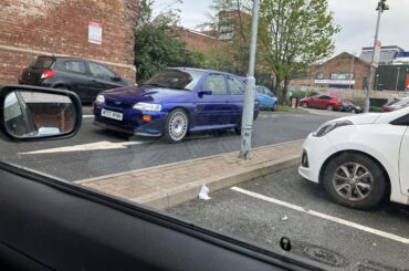 Caught me by surprise, a [Ford Escort RS Cosworth] leaving KFC in Liverpool, England.