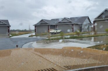 My neighbor left his Thunderbird outside with the top down. It's pouring.