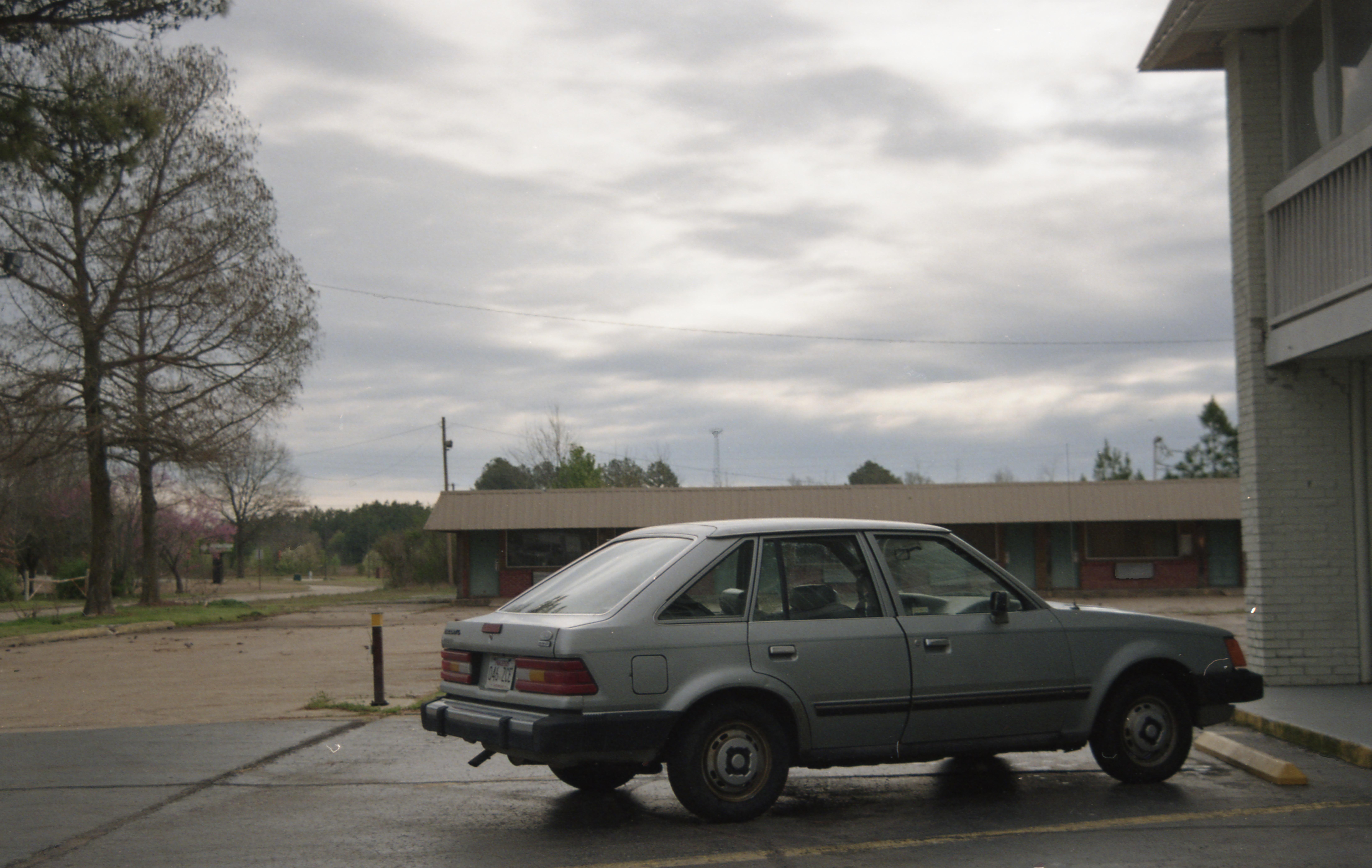 On a road trip from VA to Los Angeles I spotted an old Ford Escort at a motel in Brinkley, Arkansas