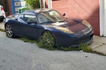 [Tesla Roadster], appers to have been sitting a bit, tags expired in 20.