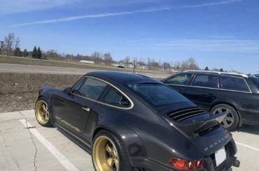 [Porsche 911 DLS] reimagined by Singer, was spotted in Minnesota. Expose carbon fiber with gold accents.