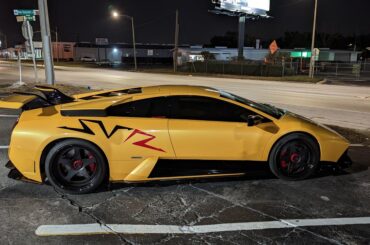 [Lamborghini Murcielago SV] parked right next to my POS truck