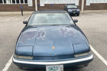 Buick Reatta with fading paint, the official car of?