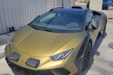 [Lamborghini Huracan Sterrato] chilling outside a boozy brunch place in Palm Springs. Stupid in all the best ways!