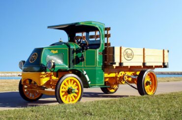 Chain-driven, solid-tire 1916 Mack AC, the official truck of?