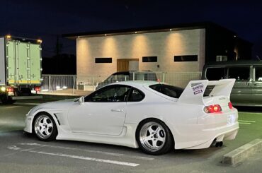 Just a white [Toyota Supra] chilling in the FamilyMart parking lot near my uni