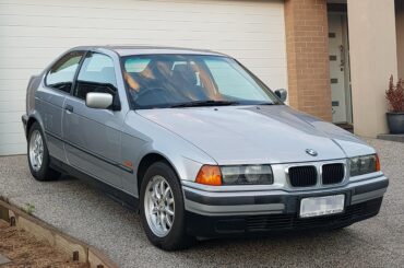 1997 BMW 318ti: the official car of being told by concerned strangers that you got rear-ended