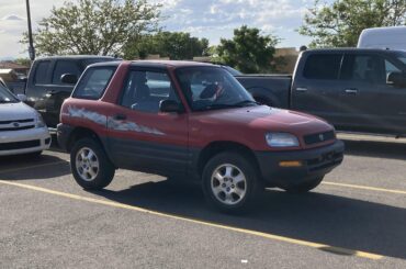 First Generation Toyota RAV4 2-Door with 90s side graphics - The official car of?