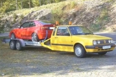 i love seeing regular cars converted into tow trucks
