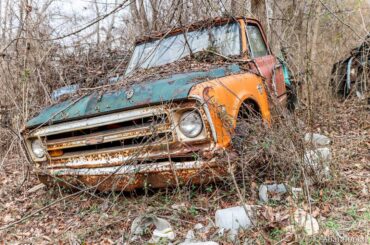 Graveyard of various Chevrolet cars and trucks, Buicks + others, West Virginia, USA