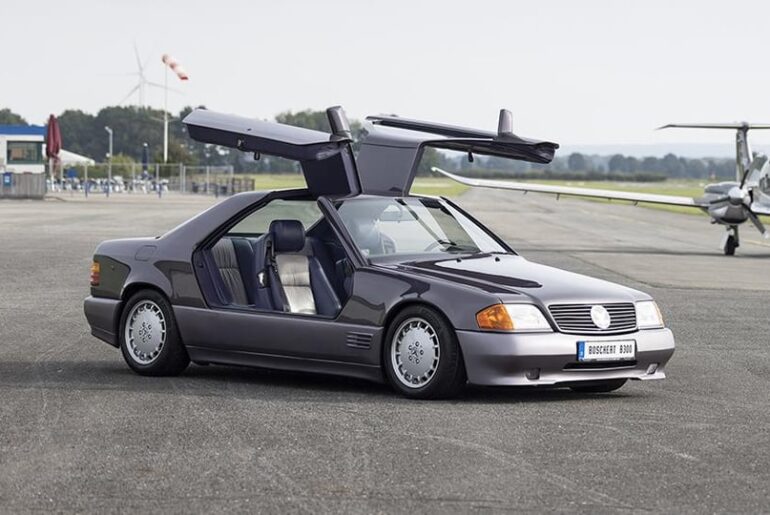 1989 Boschert B300 Gullwing - a one-off based on a C124 Mercedes 300CE with some R129 SL-Class parts and a purple interior. Sold at auction last year for €455K (US$486K).