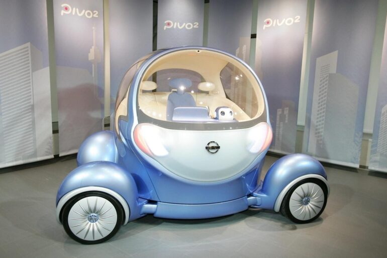 2007 Nissan Pivo concept. All four wheels can turn 90 degrees, the driving position is centered, and there's a little robot assistant on the dash whose eyes light up when it talks.