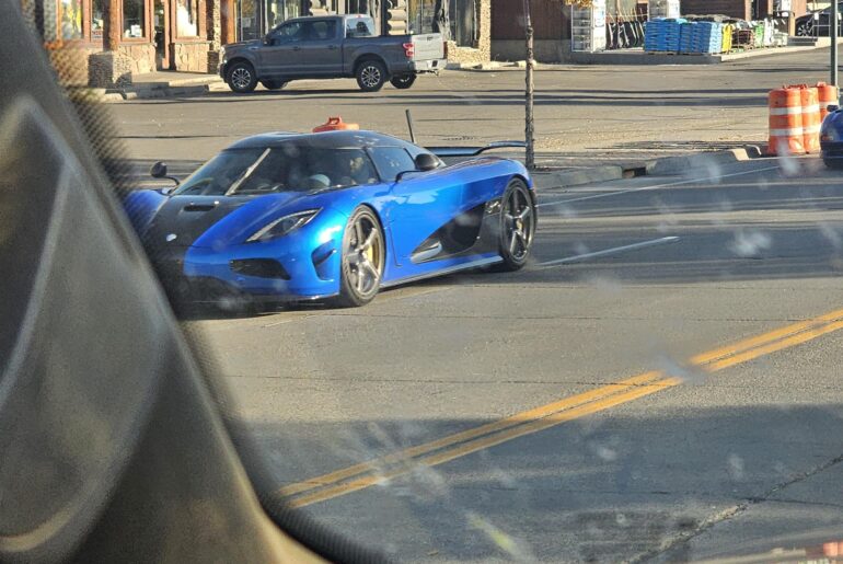 Shitty pic but I saw Stradman one more time driving his [Koenigsegg Agera HH] he was also sandwiched by the [Diablo GT and Murcielago 50 anniversary]