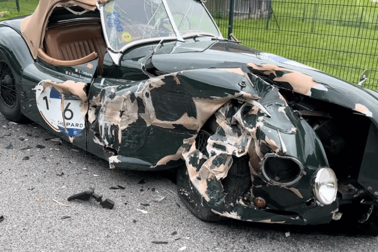 A woman on the phone and not paying attention to the road drove into a 1948 Jaguar XK120.