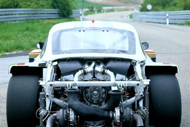 1986 Porsche 961 back view, open engine compartment. Porsche Type-935 2,847cc Flat-6, turbocharged (1249x1249)