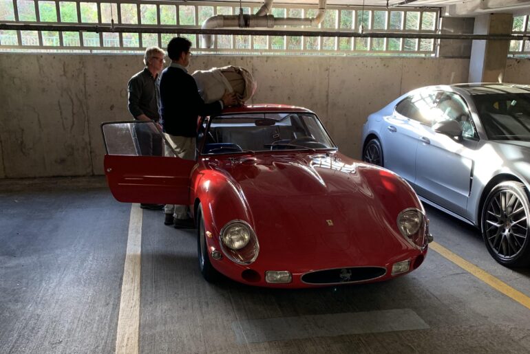 Vintage [Ferrari] in a parking garage