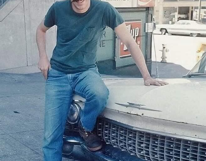 "He drivin' a drop top Cadillac"? (early 70s).