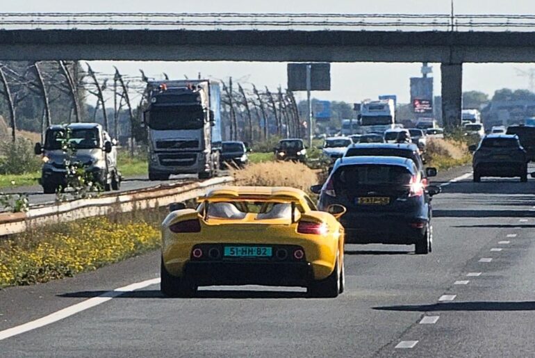 A yellow [Porsche Carrera GT] near Nijmegen, the Netherlands. Insane