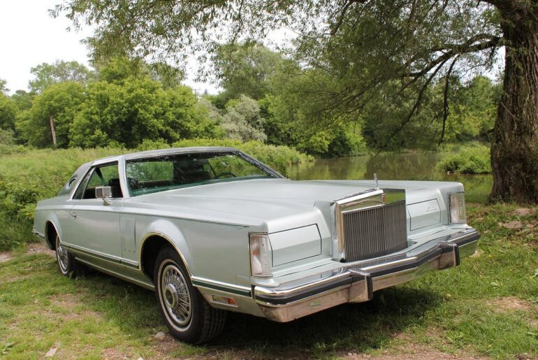 What do you think of 70s land yachts? These are my two: both with the Ford 7.5L V8, both over 230" long and weighing around 5500lbs. Others might think they're ridiculous, but I love them!