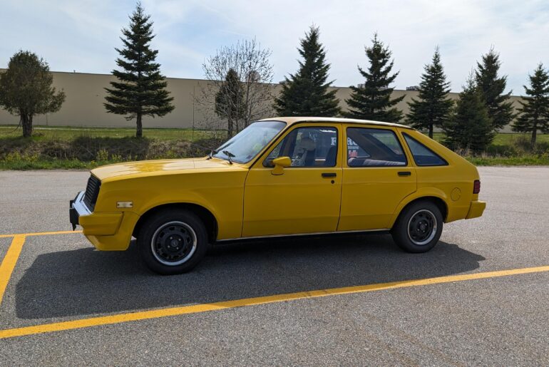 This Pontiac T1000, aka Chevy Chevette is still driving around my city.