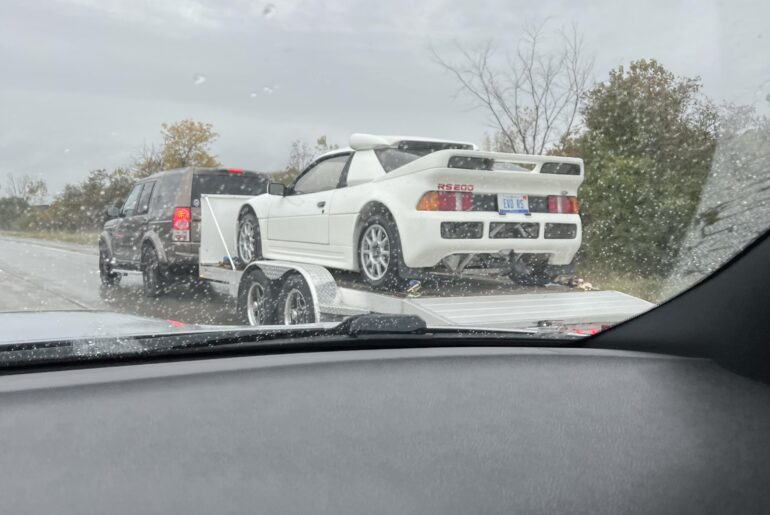 [Ford RS200] being towed in the rain